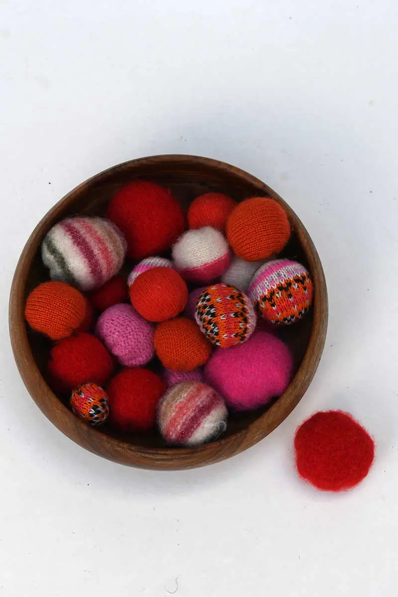 bowl of repurposed sweater balls
