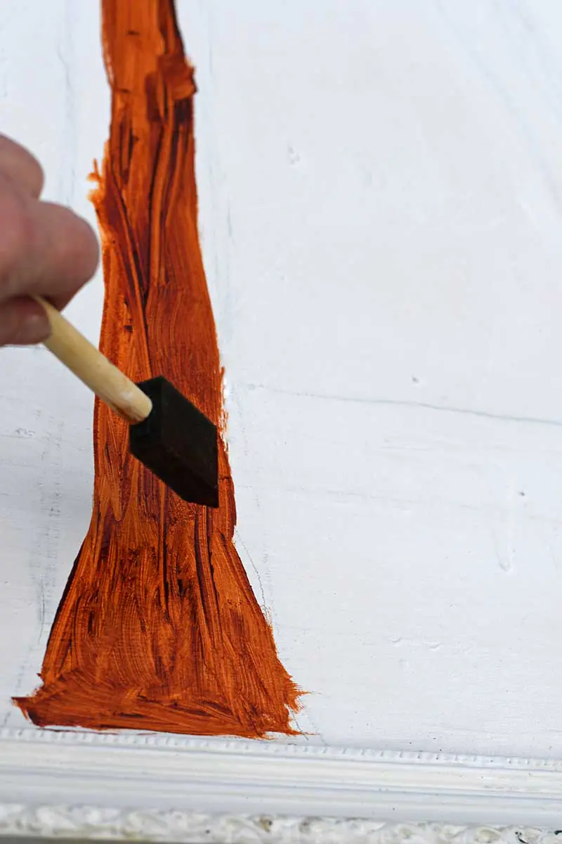 Painting Christmas tree trunk brown