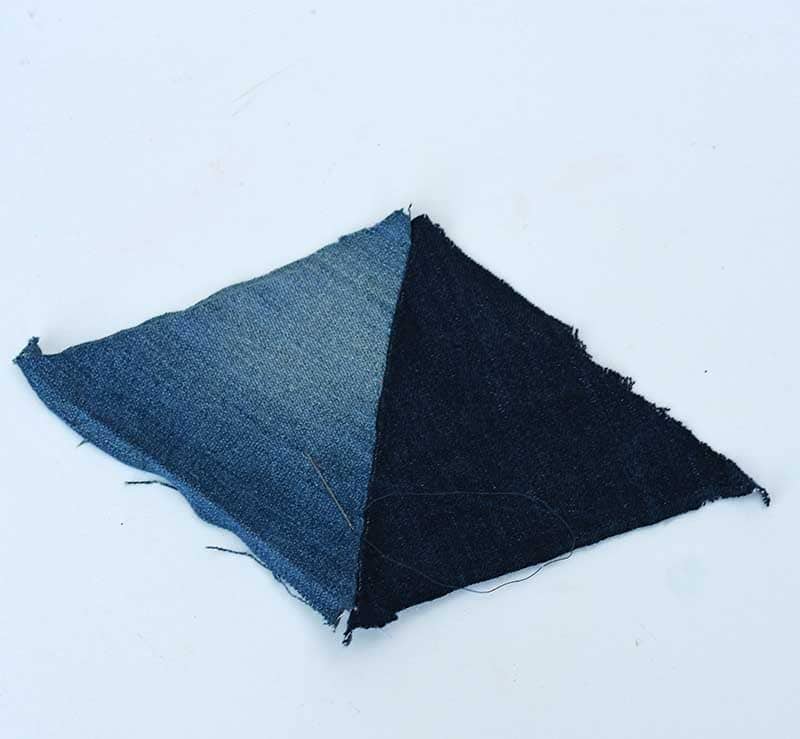 Two triangles stitched together