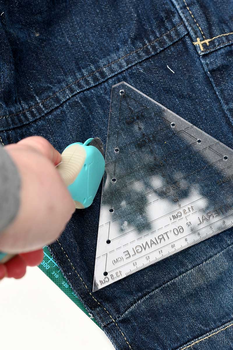 cutting out denim patchwork triangles