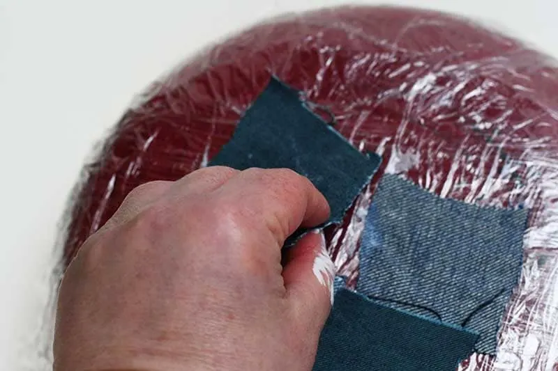 Sticking down the denim squares