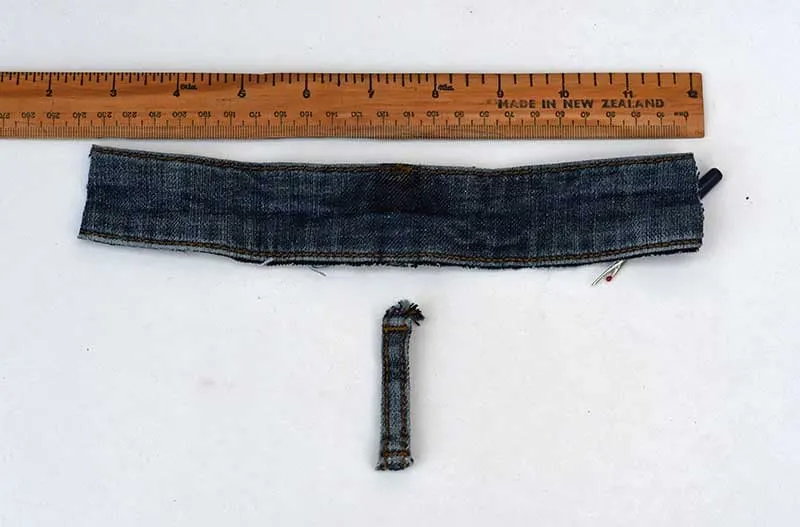 cut jeans waistband and belt loop