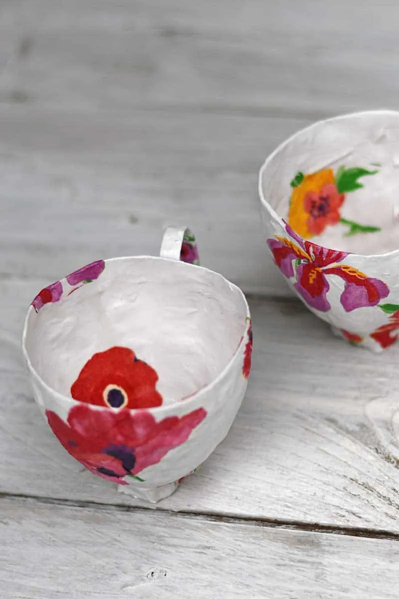 Inside paper mache teacups