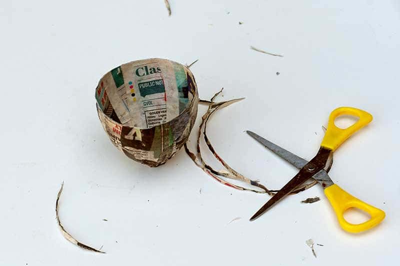 Triming the paper mache teacups