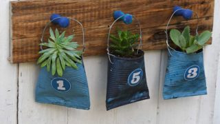 hanging tin and soda can planters