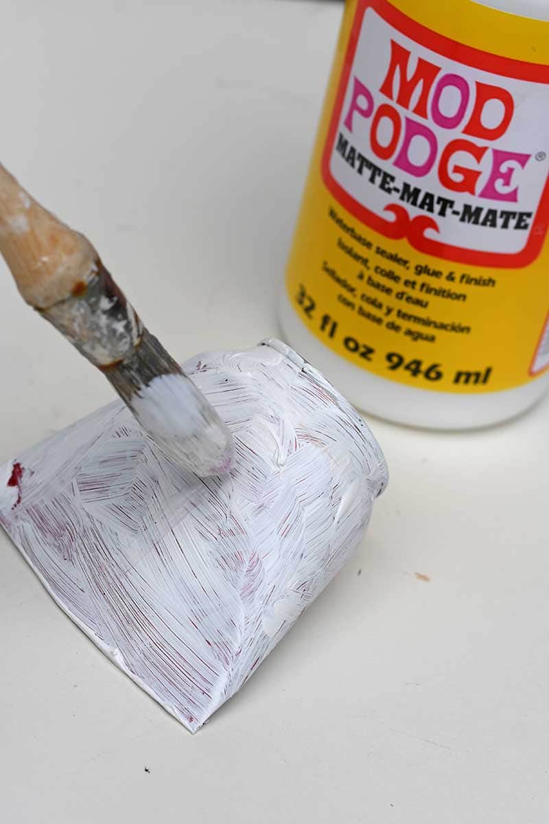 Pasting can in Mod Podge