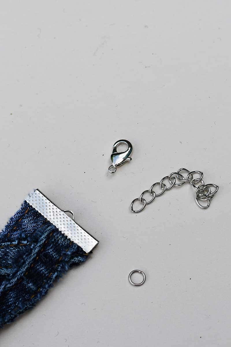 adding lobster clasp and chain to denim bracelet