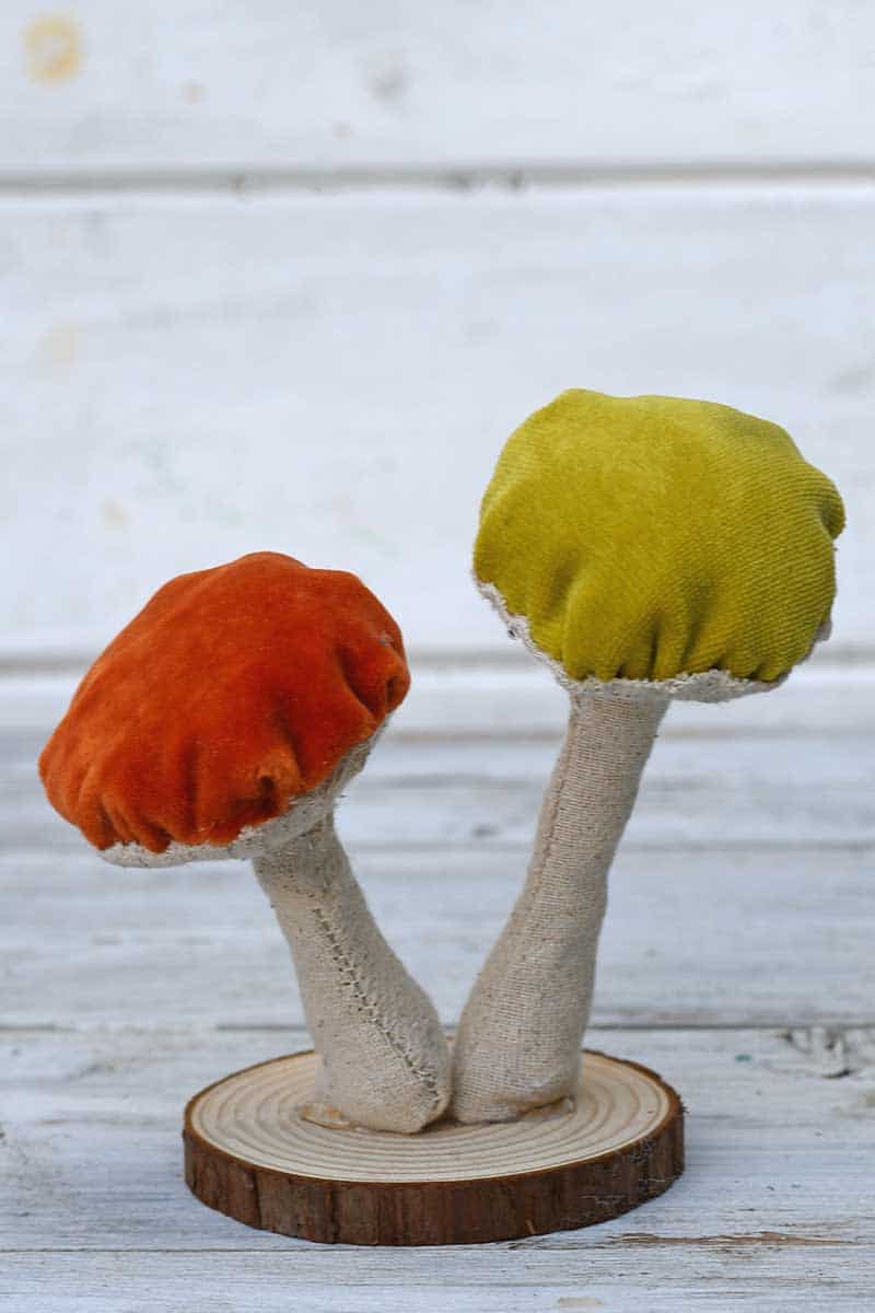 DIY fabric mushroom on woodslice