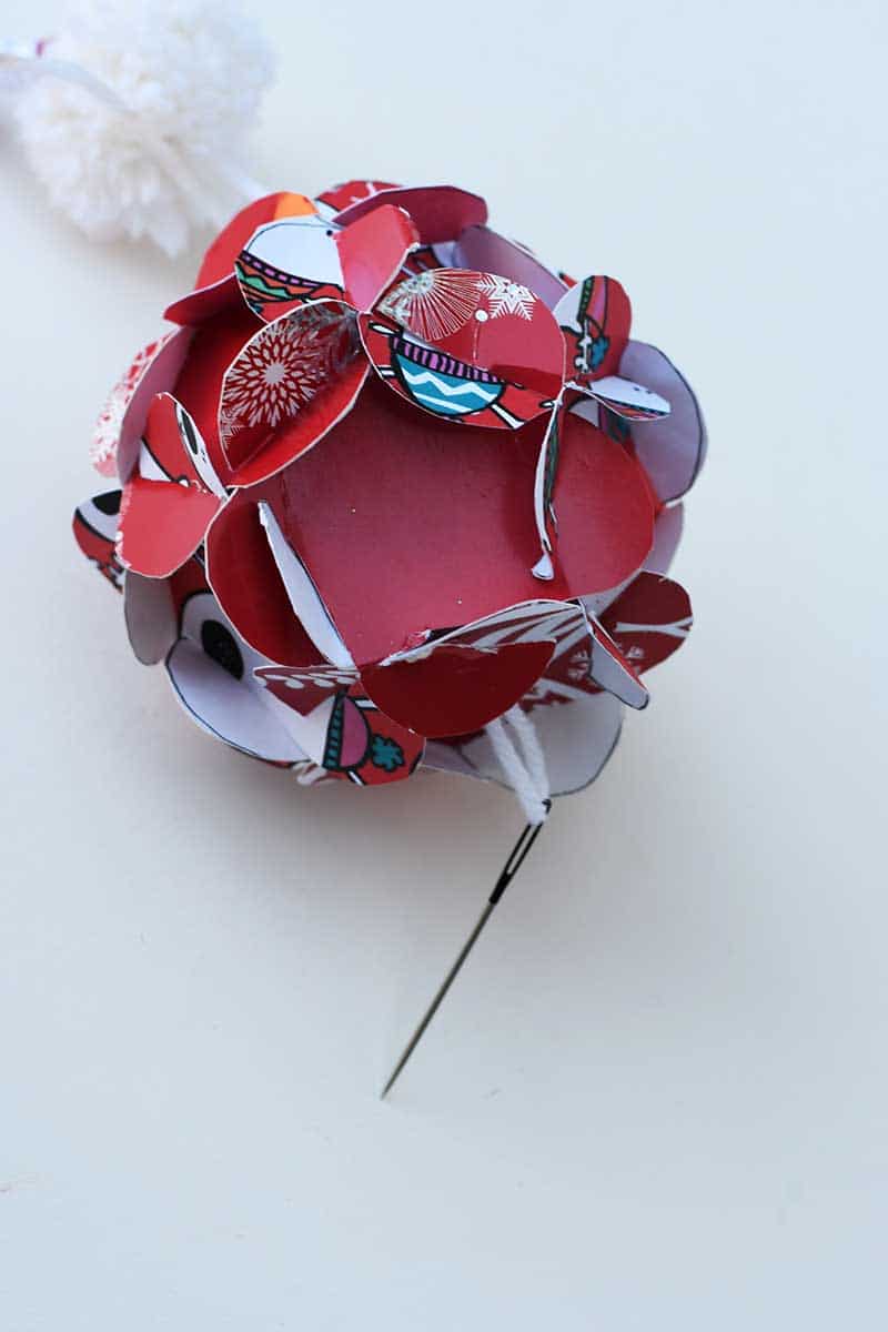 threading tassel through ornament