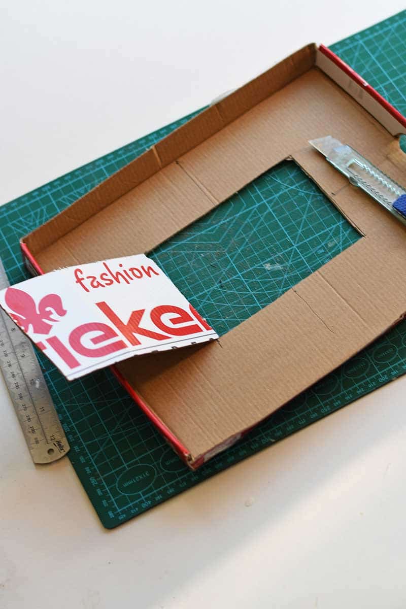 cutting out the center of shoebox lid