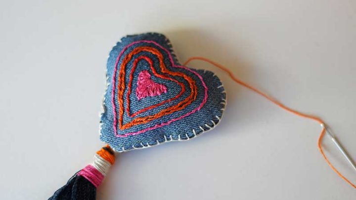 Threading through denim heart