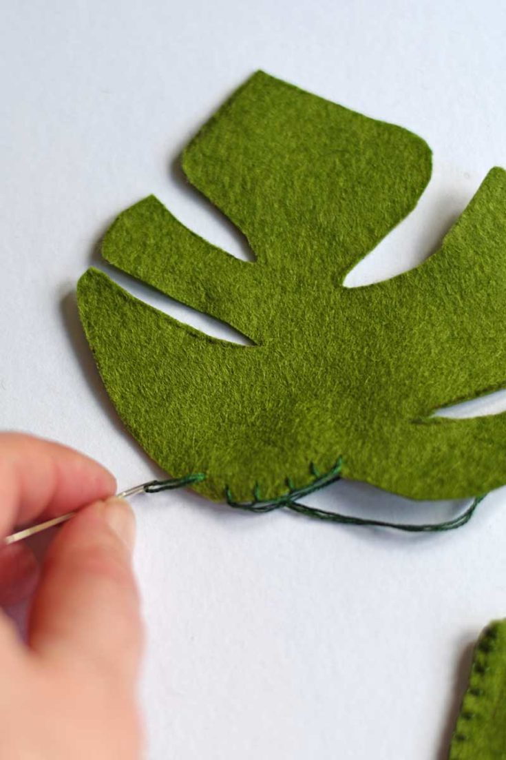 Stitching the edge of the felt leaf