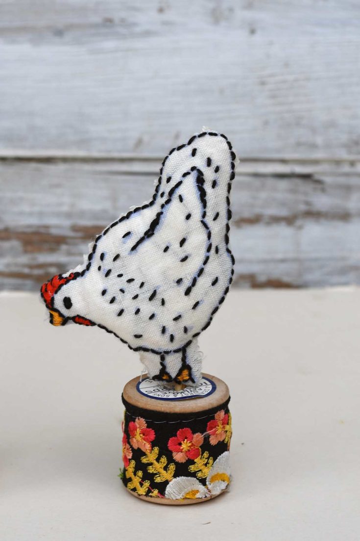 Pecking hen embroidery