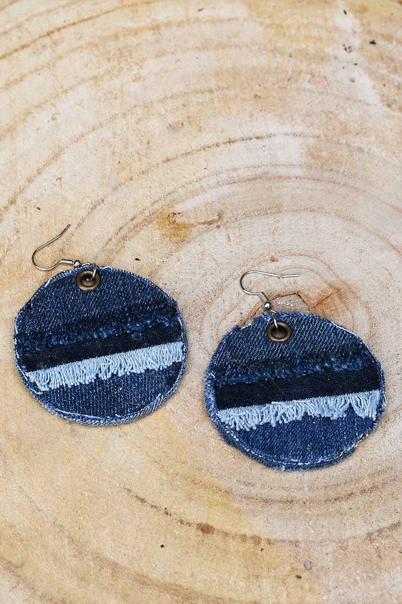 DIY denim earrings on wood