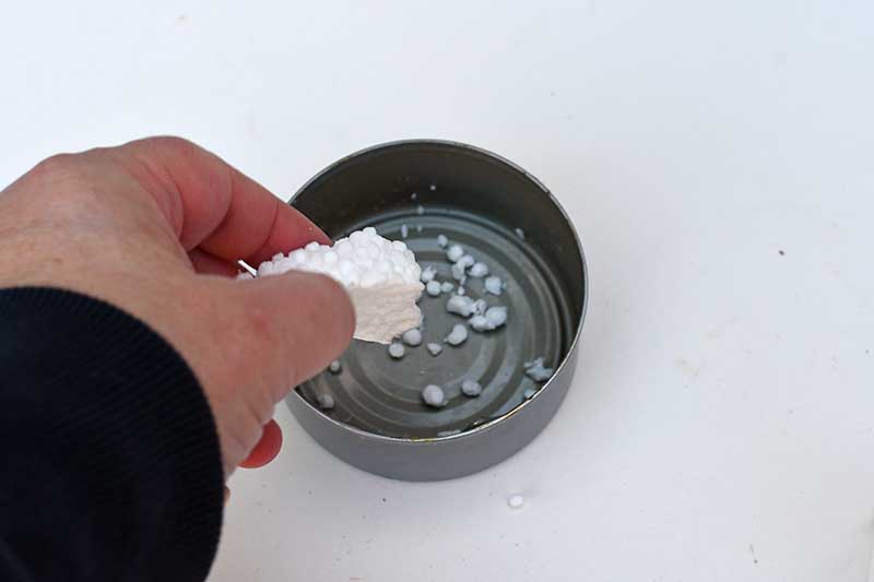 Crumbling polystyrene into snow balls