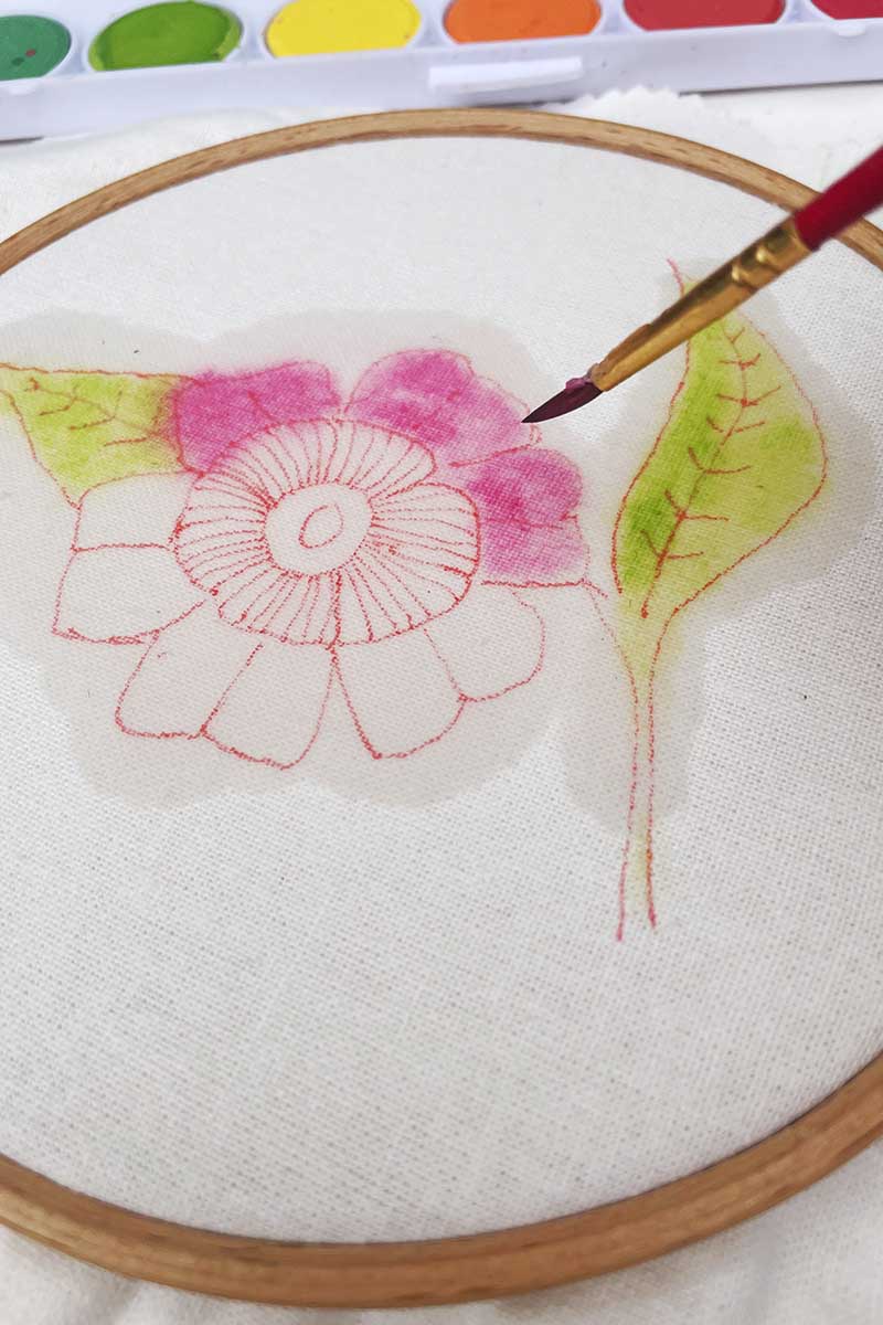Painting the flower petals with watercolour paints