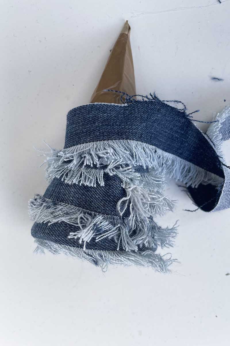 Glueing denim to DIY Christmas Tree Cones