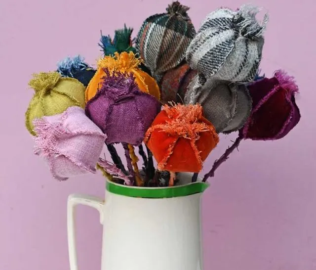 Jar full of fabric poppy seed heads