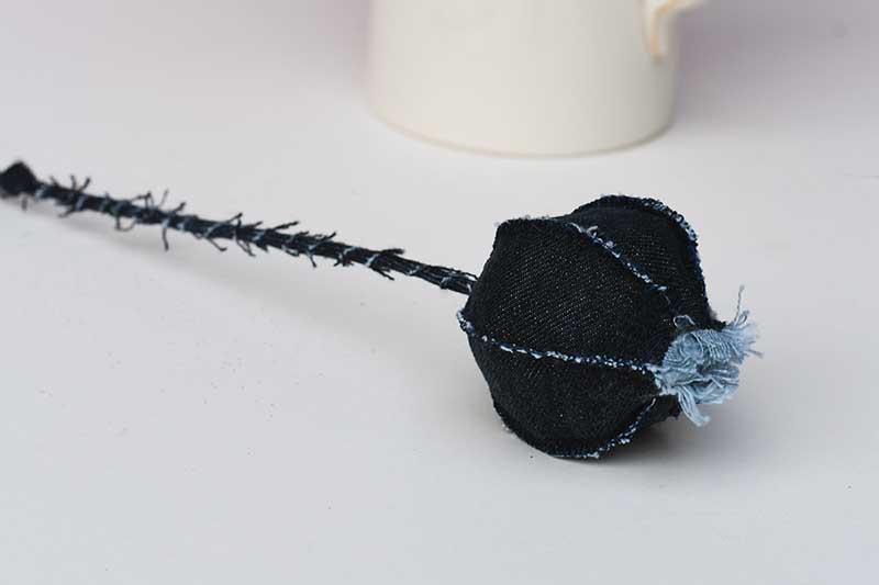 Denim fabric poppy seed head decoration