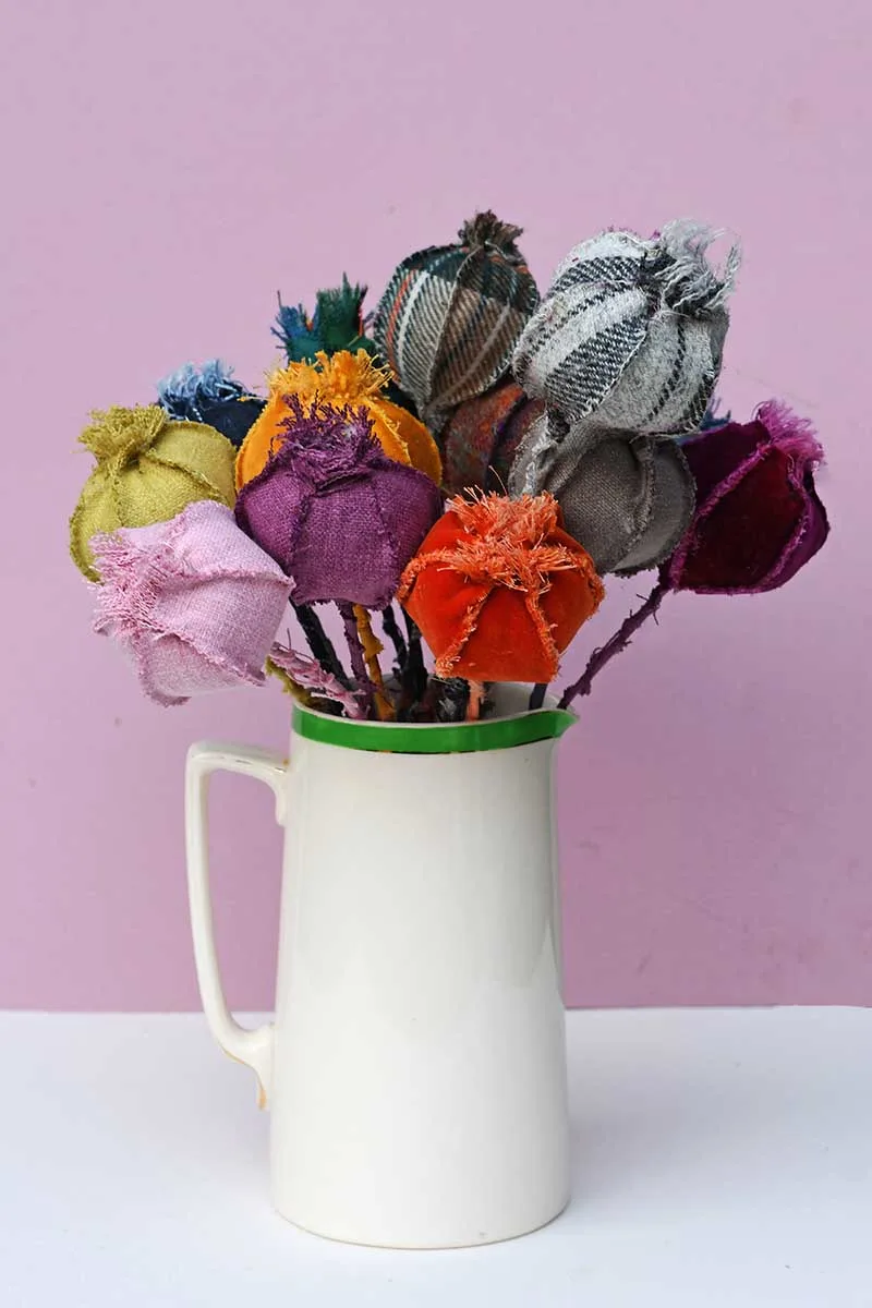 Jar full of fabric poppy seed heads