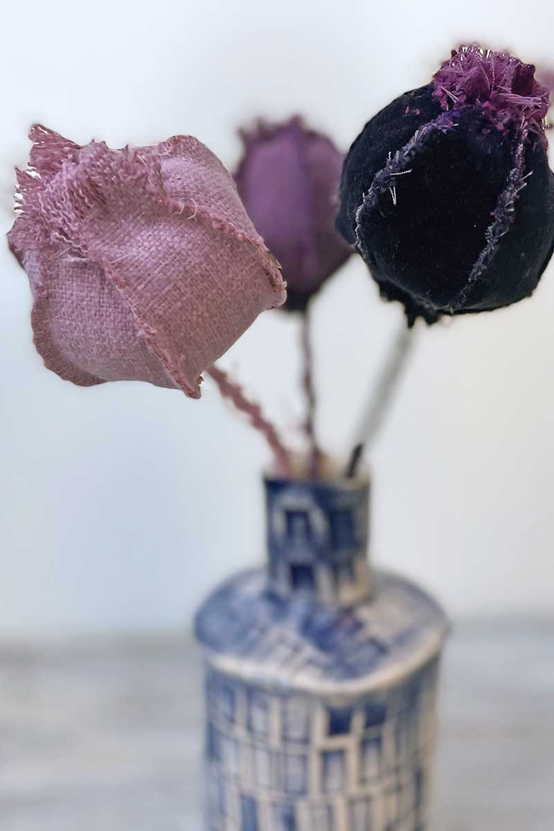 Pink poppies in vase