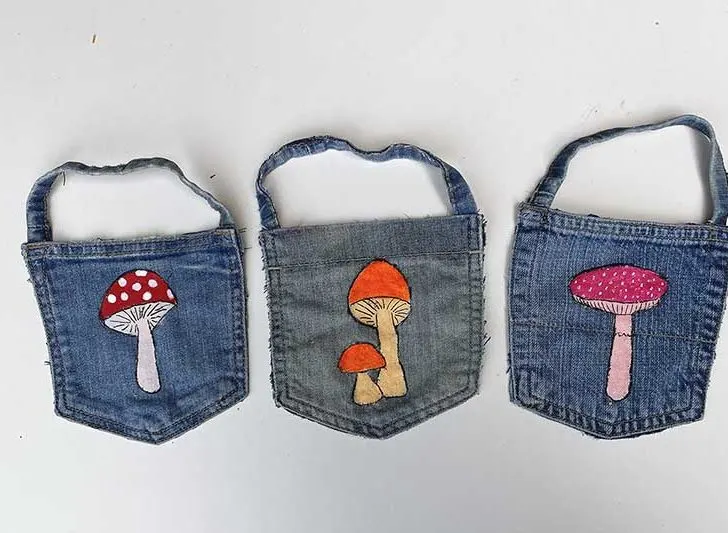 All three jeans  pockets with mushroom motives