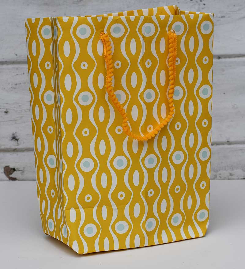 Finished diy gift bag made from wrapping paper