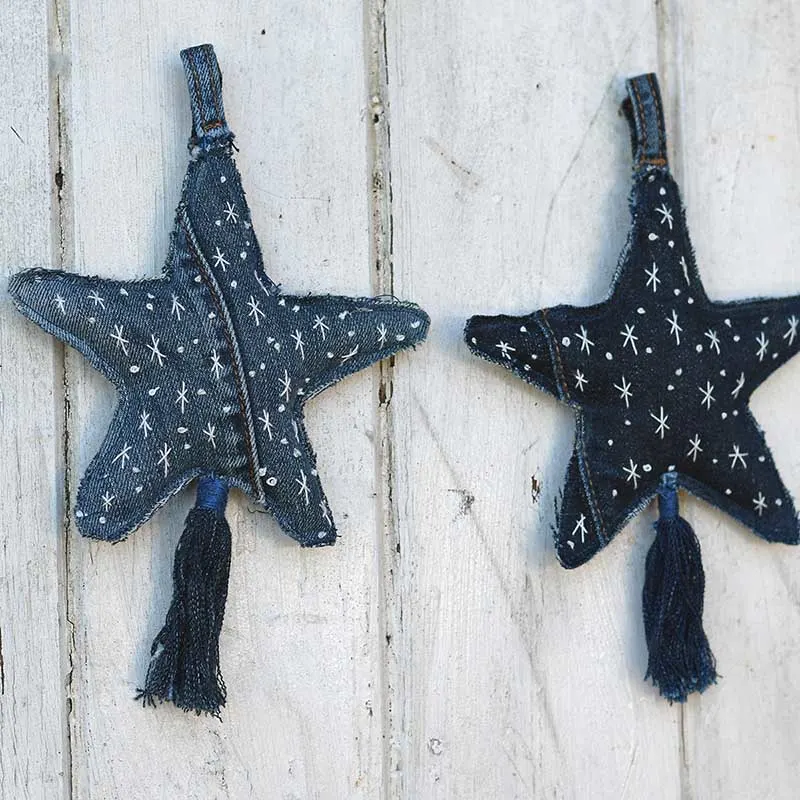 pair of denim embroidered fabric star ornaments