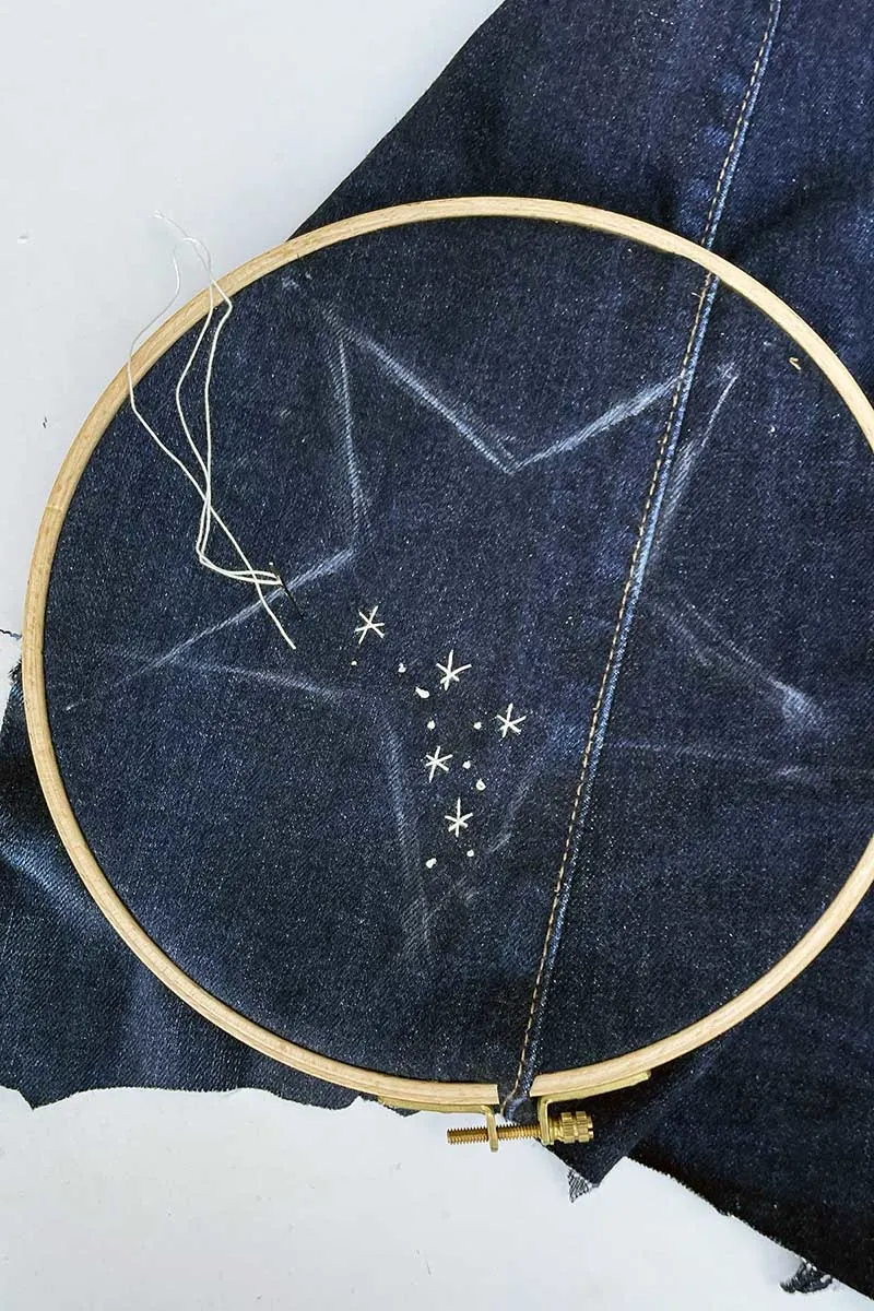 Embroidering stars on denim