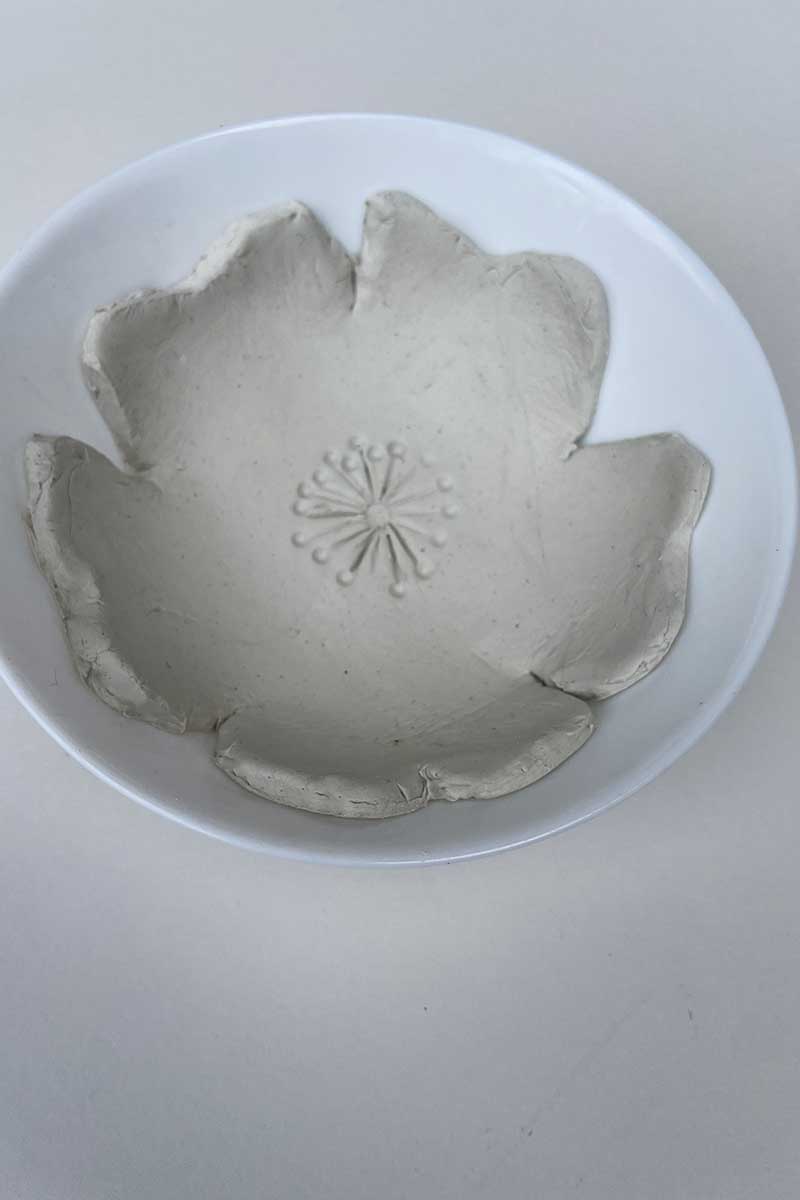 air dry clay trinket dish drying in a bowl mould