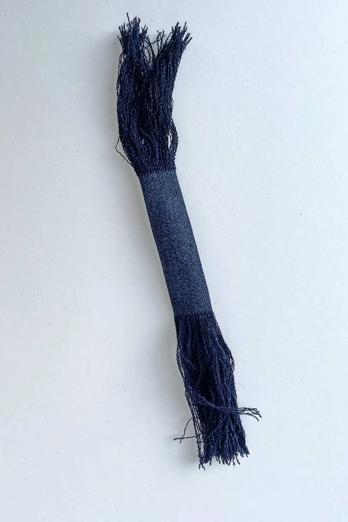 frayed denim tube for a Boho diy denim necklace