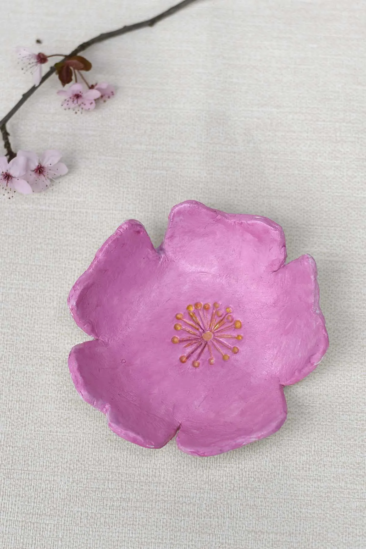 Air dry clay trinket dish in the shape of cherry blossom