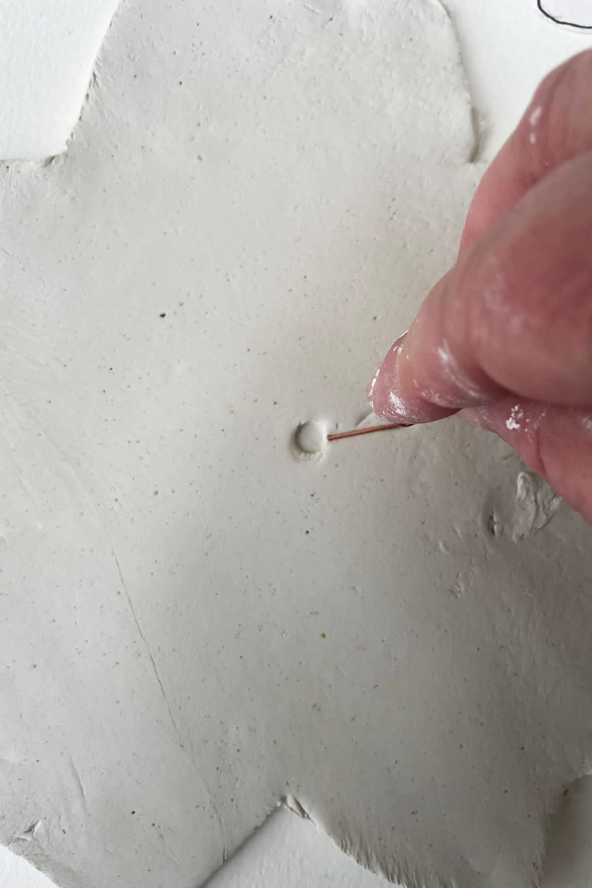 stamping indents into air dry clay