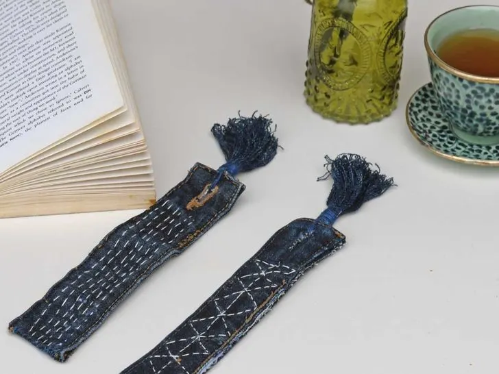Pair of denim bookmarks with Sashiko stitching book and cup of tea