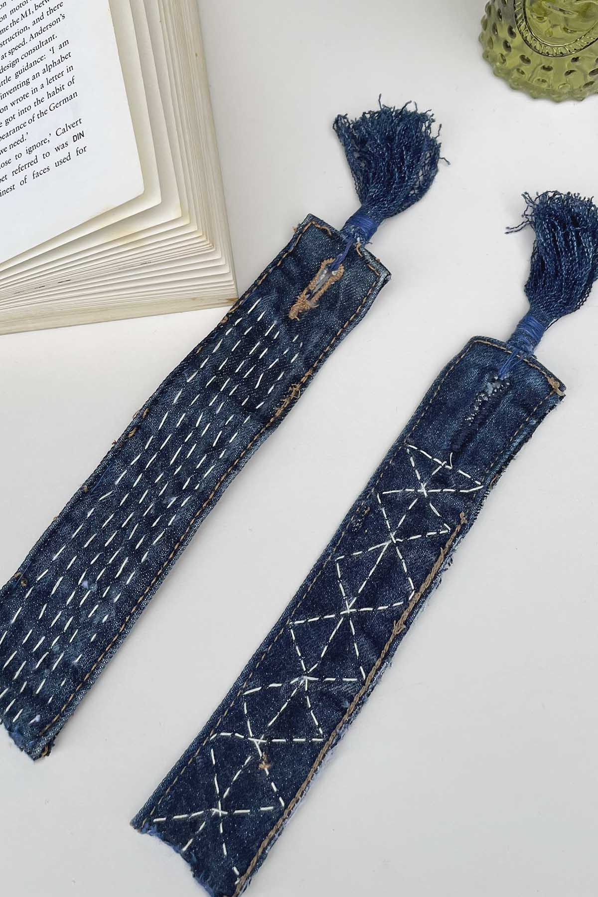 pair of Sashiko embroidered denim bookmarks with book