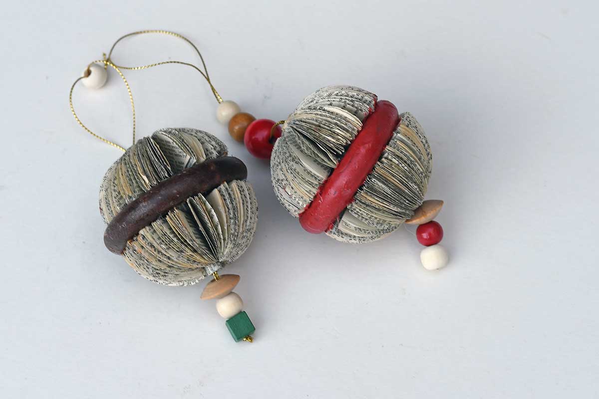2 book page ornaments DIY paper Christmas baubles