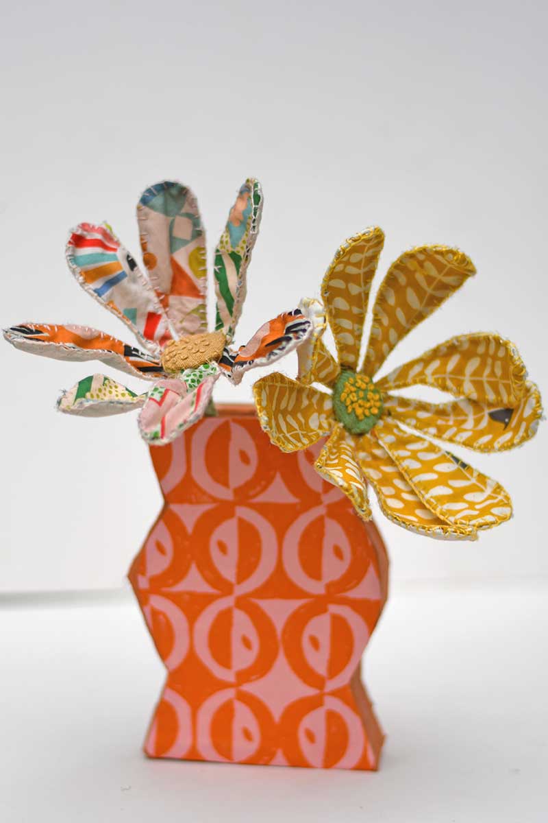 paper mache vase with whimsical scrap fabric flowers