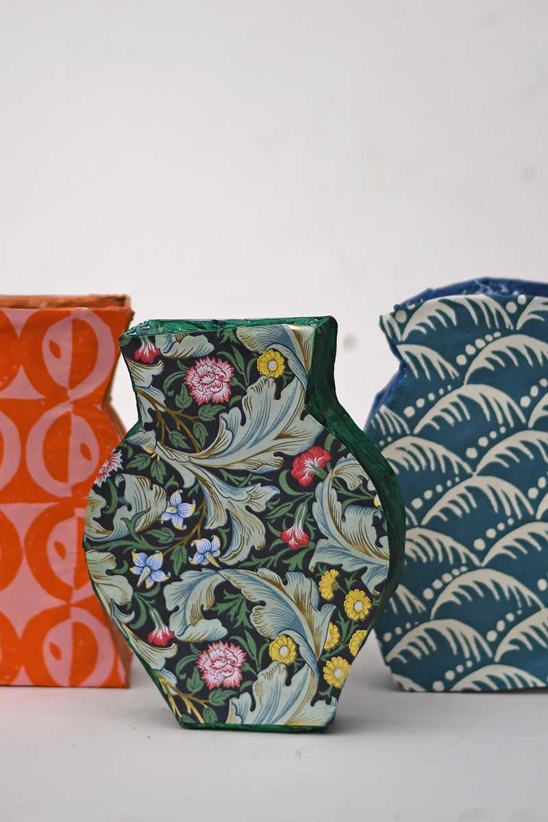 All three paper mache patterned vases