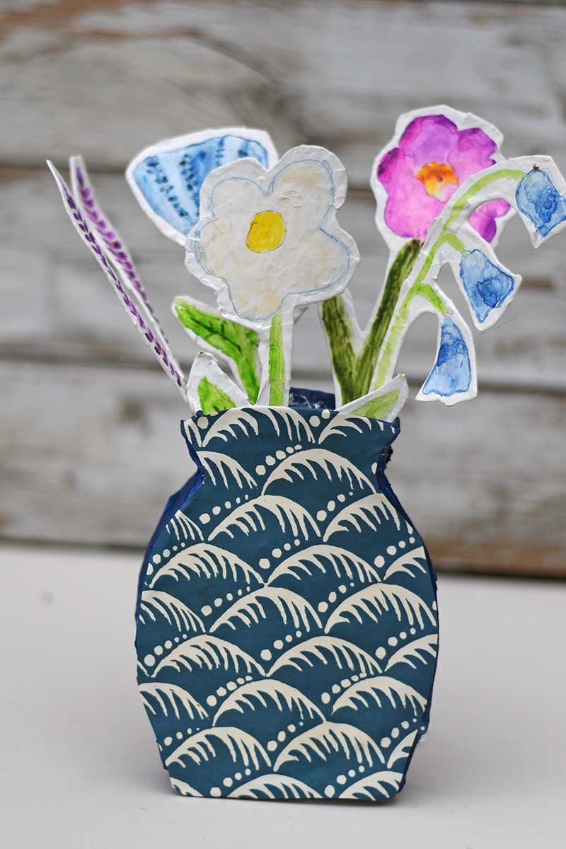 paper mache vase with paper mache flowers