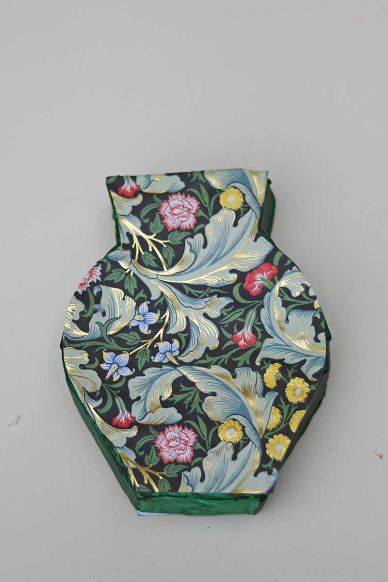 decoupaged paper mache vase