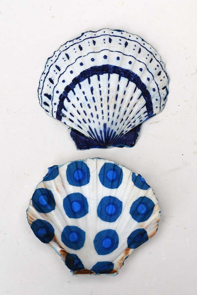 Decorated scallop shells front and back for DIY coastal bookends