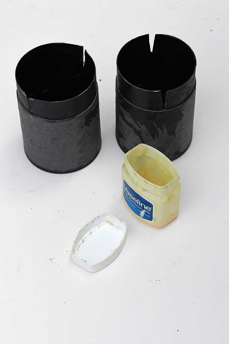 Greasing the book end moulds