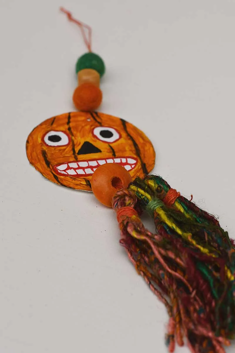 Spooky pumpkin upcycled tin can halloween decoration hanger