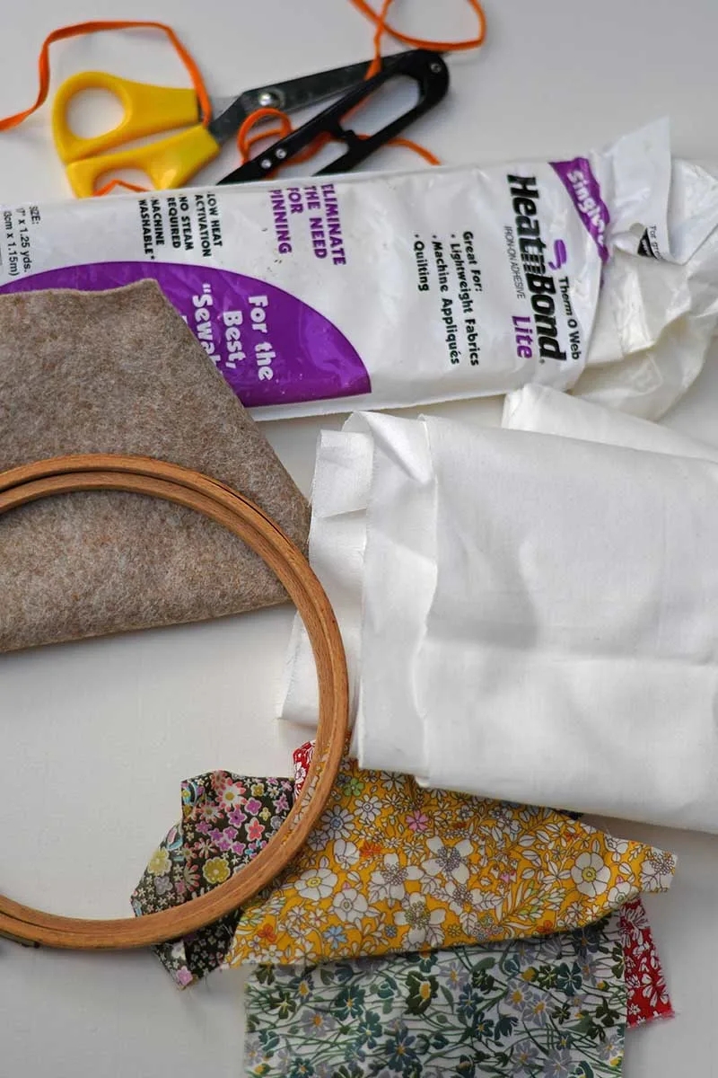 What you need for free motion embroidery applique scrap fabric mushroom and snail ornaments, includes hoop, fabric scraps and iron on interfacing