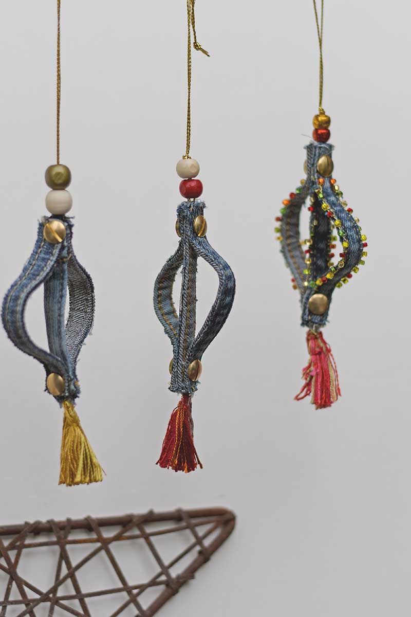 Hanging denim ornaments made with jean seams