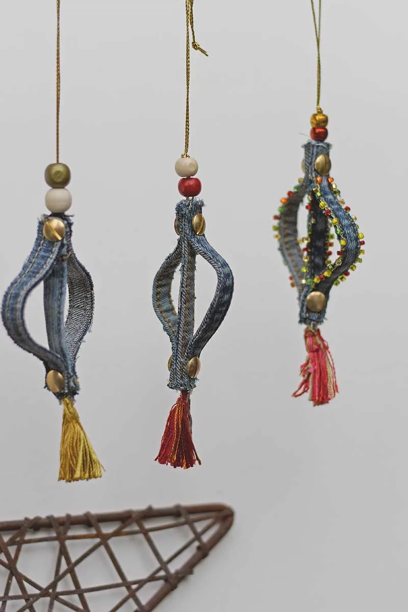 Hanging denim ornaments made with jean seams