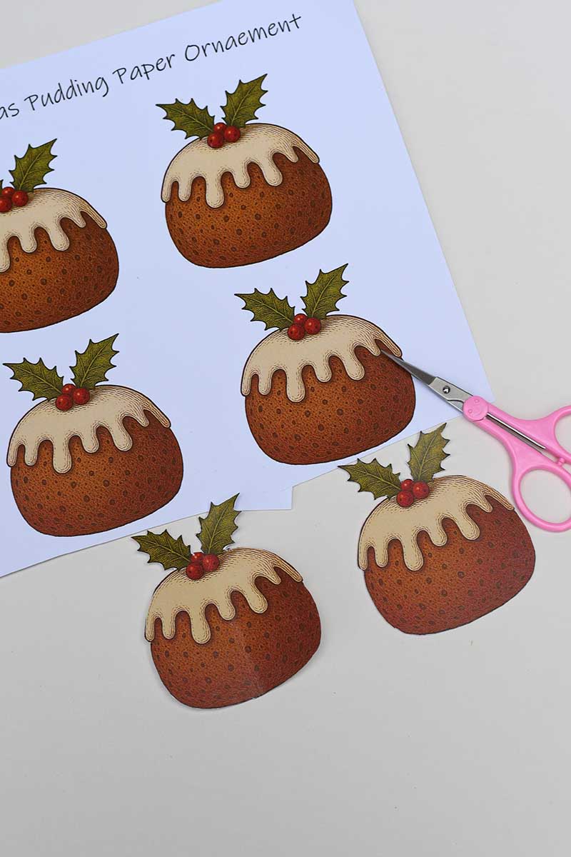 Cut out paper Christmas pudding ornaments