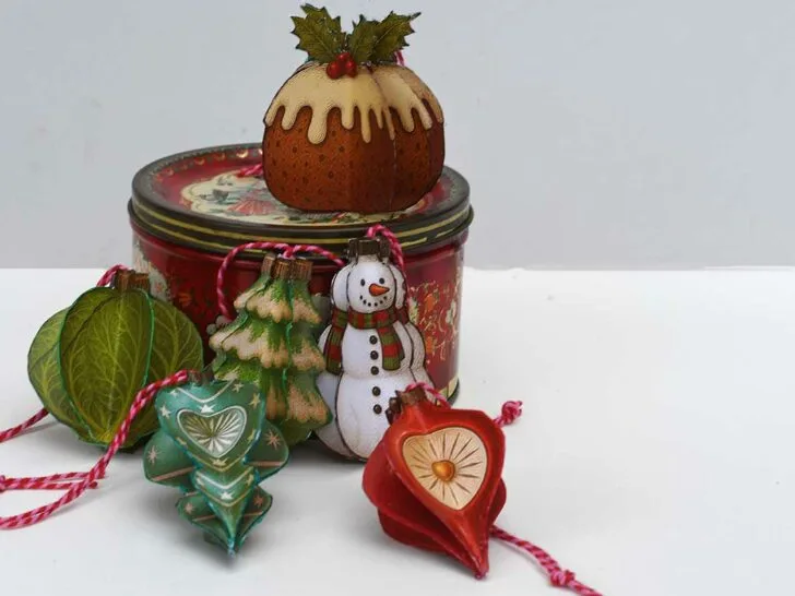 Six printable 3d retro paper Christmas ornaments Brussels sprout, Christmas pudding, snowman, Christmas tree and 2 shiny brite baubles with a vintage tin.