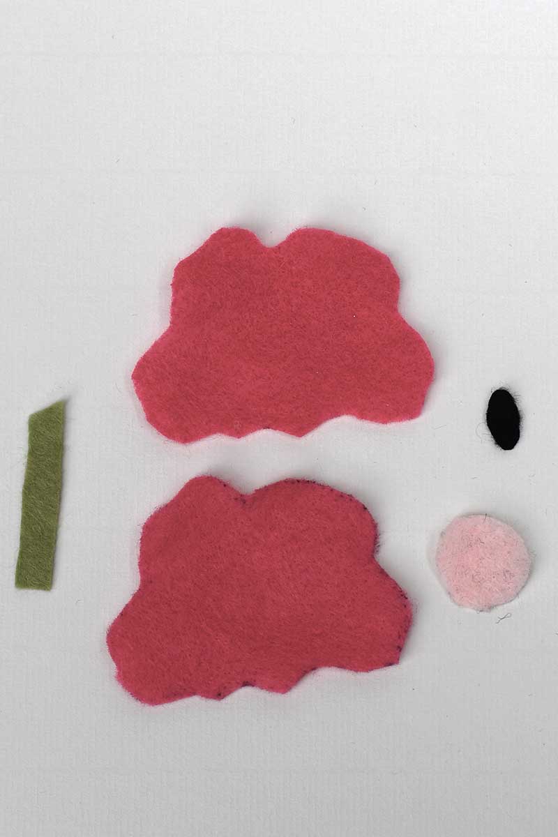 Cut out felt pieces for DIY felt poppy brooch