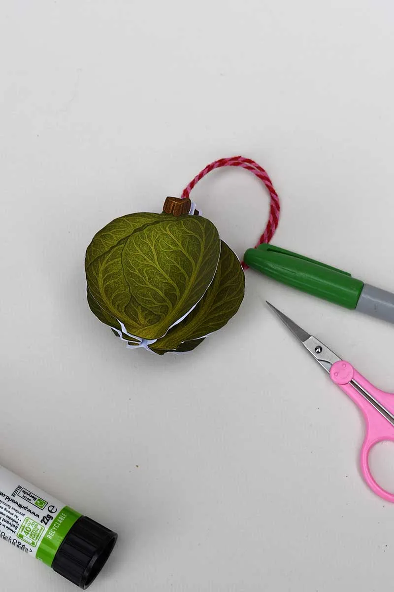 Trimming the sprout paper Christmas ornament